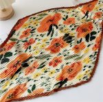 foulard plissé motif floral orange